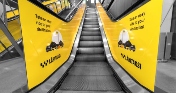 https://info.clearchannel.fi/hubfs/Website/Images/Web/Lahitaksi_Escalator-Branding_3_T2_MV@2x.jpg